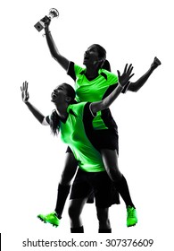 Two Women Playing Soccer Players In Silhouette Isolated On White Background