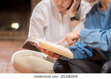 Two Women Praying Together And Encourage Each Other. 