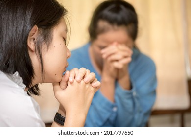 Two Women Praying Together And Encourage Each Other. 