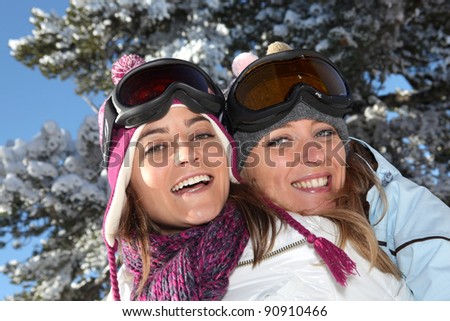 Two women ready to ski