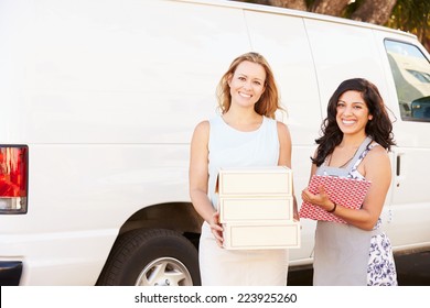 Two Women Running Catering Business With Van