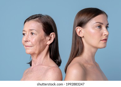 Two Women Standing Back To Back