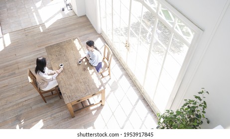 Two women talking at home