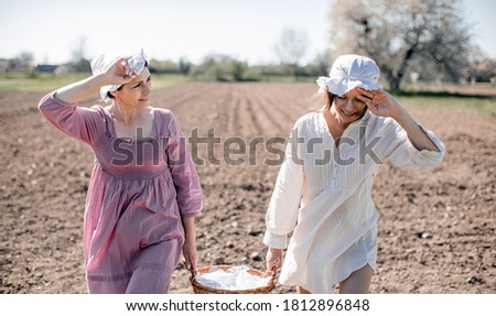 two women working in farm
