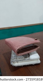 two women's wallets on the table