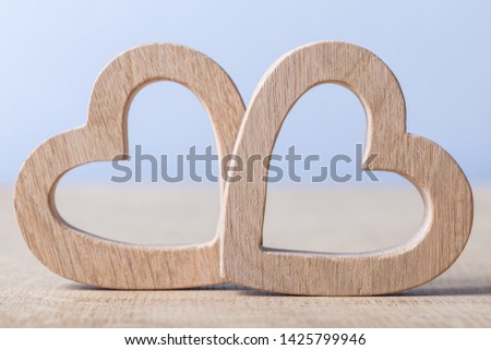 two wood hearts simbol of love