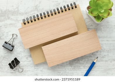 two wooden blocks on a wooden background for your text. free space for business concept template and banner.