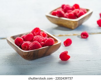 Two Wooden Bowls With Fresh Raspberries. Fragrant Healthy Dessert, Sweet Food, Vitamins. There Are No People In The Photo. Advertising, Banner.