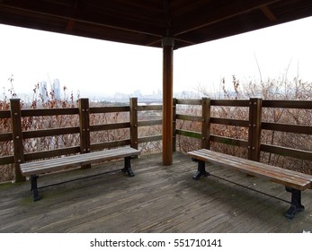 Two Wooden Chairs Facing Each Other