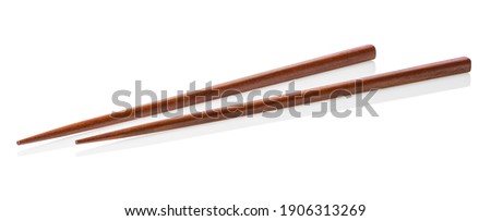 Two wooden chopsticks isolated on a white background