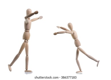 Two Wooden Figures Are Coming Together To Hug As A Greeting, Isolated On White.