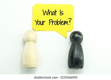 Two Wooden Peg Dolls And A Conversation Box With The Word Or Question What Is Your Problem