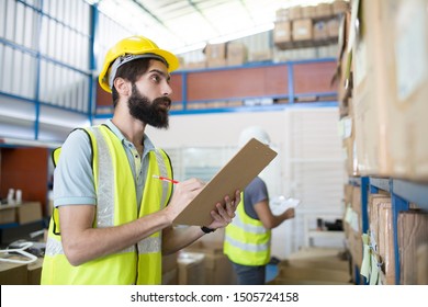 Two Worker Checking Stock In Ware House 