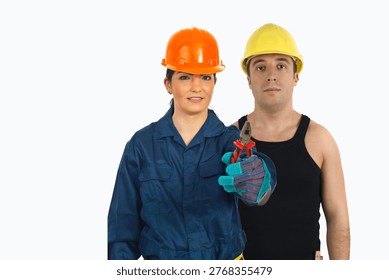 Two workers stand side by side, wearing hard hats. One wears blue coveralls, the other a black tank top. They both look directly at the camera, showing confidence