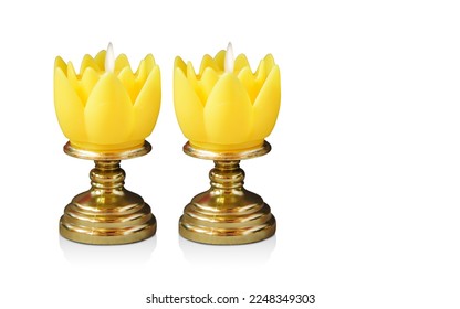 two yellow candles placed gold pedestal white background  object  decor  retro  religion  copy space