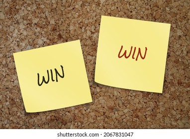 Two Yellow Notes On Cork Board With Handwritten Text WIN WIN, Means A Situation Which Each Party Benefits In Some Way, Good For Everyone That Is Involved, Accept Negotiation Offer With No Losers