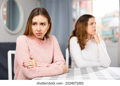 Two Young Adult Women Ignoring Each Other After Home Quarrel, Girlfriends Having Problems In Relationship