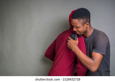 Two Young African Guys Meet And Greet, Hug Eachother