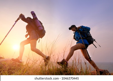 Two Young Asian Female Hipster Hiking On Mountain Holiday, Wild Adventure. Background For Travel Concept 