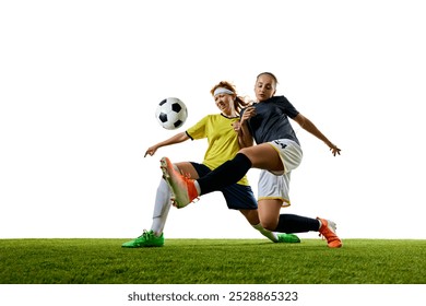 Two young athletic women, soccer players in their 20s, engaged in close tackle on soccer field, both intensely focused on winning ball. Concept of sport, competition, tournament, games, event. - Powered by Shutterstock