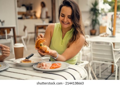 Two Young Beautiful Women Friends Have Breakfast Together, Friendly Brunch.