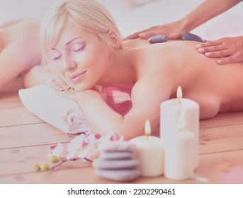 Two young beautiful women relaxing and enjoying at the spa. Two young beautiful women relaxing - Shutterstock ID 2202290461