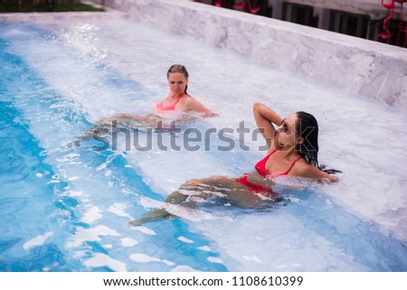two young beautiful women in  resort