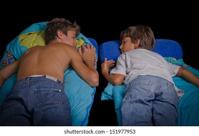 Two Young Boys Sleep On Sleeping Bag