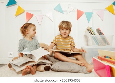 Two young children sit, enjoy their reading in bright kids-friendly library full of colorful books - Powered by Shutterstock