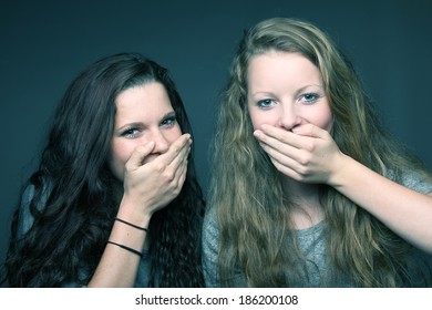 Two young happy girlfriends - Shutterstock ID 186200108