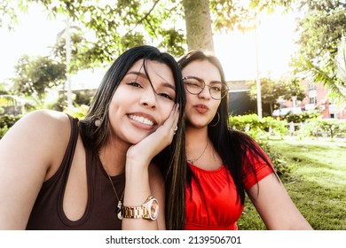 Two Young Latin Woman Friends Taking A Selfie.