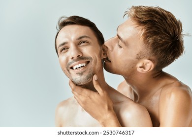 Two young men express affection, enjoying an intimate and playful connection together.