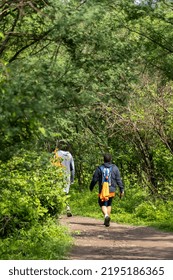 two young men and friends descending in the ravine, vegetation and trees, huentitan ravine guadalajara, mexico, latin america - Shutterstock ID 2195186365
