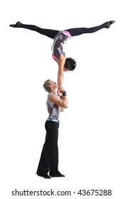 Two Young Modern Acrobats Posing On White