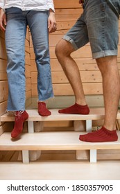 Two young people talking to each other. Lower body close-up.