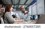 Two Young Professionals Collaborate Using ERP And CRM Software For Business Management, Data Analysis
