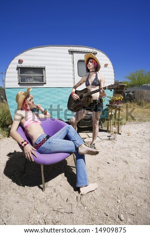 Two Young Punk Women in Front of a Trailer