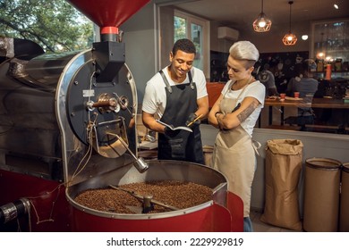 Two young roast masters engaged in work - Powered by Shutterstock