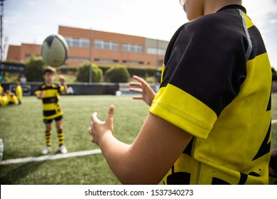two young rugby players warming up before entering to play