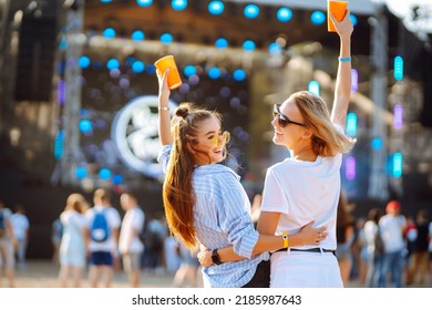 Two young woman with beer at beach party. Summer holiday, vacation concept. Friendship and celebration concept. - Shutterstock ID 2185987643