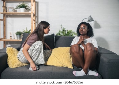 Two Young Women College Roommates Or Coworkers Argue About Rent And Expenses For The Apartment 