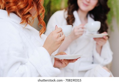 two young women drinking tea after Spa treatments