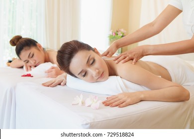 Two Young Women Relaxing In Spa Salon