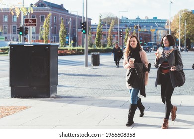 Two Young Women Walking Outdoor Having Fun