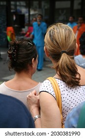 Two Young Women Watching Samba Band Performance,Santiago,Chile