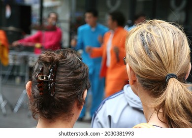 Two Young Women Watching Samba Band Performance,Santiago,Chile