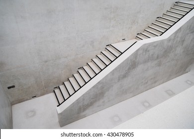 Two-level terrazzo staircase in outdoor area of white wall building - wide angle background - Powered by Shutterstock