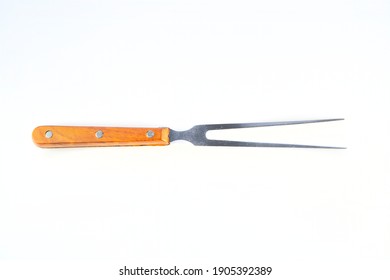 Two-pronged fork isolated on white background, photography for design