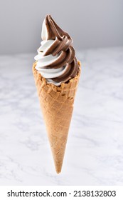 Two-Tone Ice-Cream soft cream Milk and Chocolate in a cone