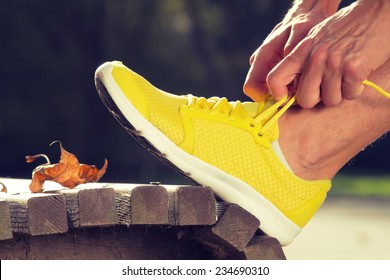 Tying The Running Shoes. 